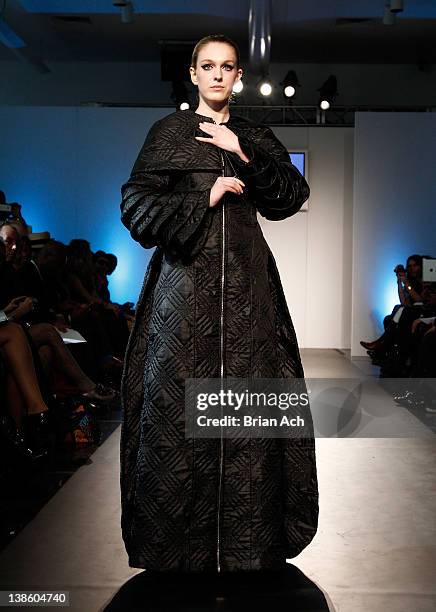 Model walks the runway at the Megla M runway show during Nolcha Fashion Week New York at the Alvin Ailey Studios on February 9, 2012 in New York City.