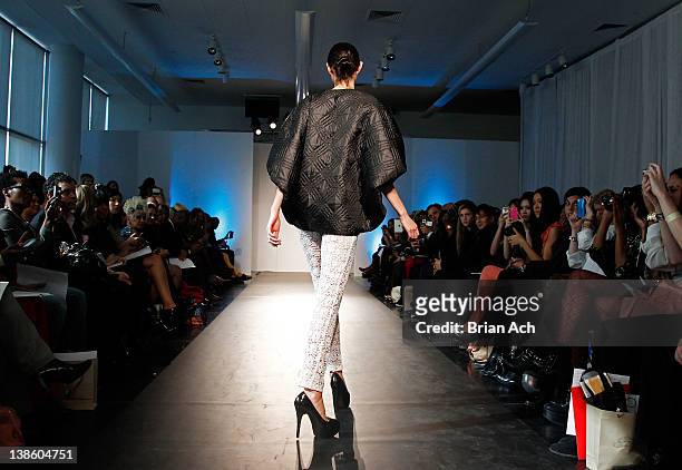 Model walks the runway at the Megla M runway show during Nolcha Fashion Week New York at the Alvin Ailey Studios on February 9, 2012 in New York City.
