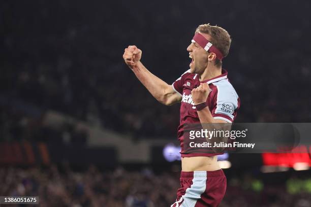 Tomas Soucek of West Ham United celebrates with after scoring their team's first goal during the UEFA Europa League Round of 16 Leg Two match between...