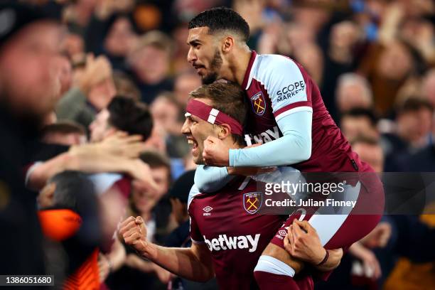 Tomas Soucek celebrates with Said Benrahma of West Ham United after scoring their team's first goal during the UEFA Europa League Round of 16 Leg Two...