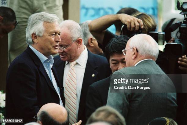German politician Bernd Schmidbauer , Japanese Deputy Foreign Minister Toshimitsu Motegi , and former Soviet President Mikhail Gorbachev talk...