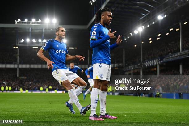 Alex Iwobi of Everton celebrates after scoring their sides first goal during the Premier League match between Everton and Newcastle United at...