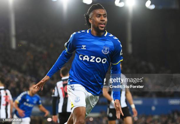 Alex Iwobi of Everton celebrates after scoring their sides first goal during the Premier League match between Everton and Newcastle United at...