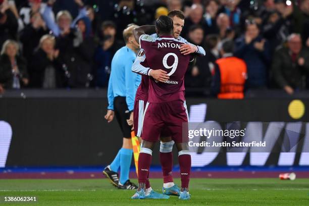 Andriy Yarmolenko celebrates with teammate Michail Antonio of West Ham United after scoring their team's second goal during the UEFA Europa League...