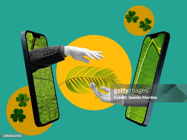 smartphones connecting people for saving green planet - choicepix stock pictures, royalty-free photos & images