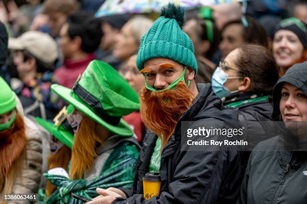 Spectators wear Irish-themed accessories during the 2022 NYC St. Patrick's Day Parade on March 17, 2022 in New York City.