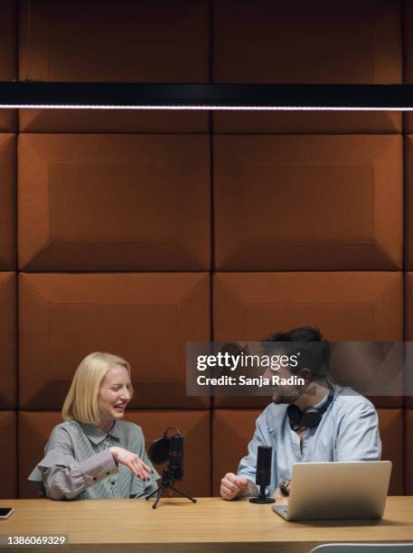 two young hosts recording a podcast - media interview stock pictures, royalty-free photos & images