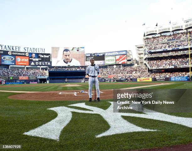New York Yankees' Derek Jeter pays tribute to owner George Steinbrenner and legendary announcer Bob Sheppard before a game against the Tampa Bay Rays...