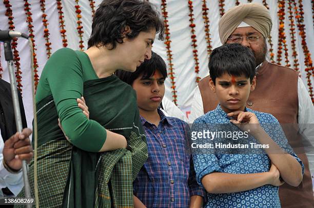 Priyanka Gandhi Vadra, her son Raihan and daughter Miraya attend an election rally on February 9, 2012 in Rae Barelly, India. For the older...
