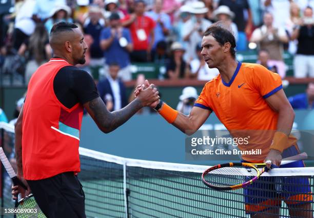 Rafael Nadal of Spain shakes hands at the net after his three set victor against Nick Kyrgios of Australia in their quarterfinal match on Day 11 of...