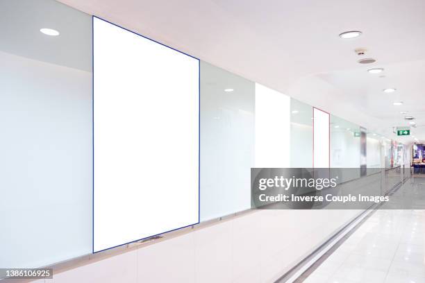 advertisement blank billboard - airport shop stock-fotos und bilder