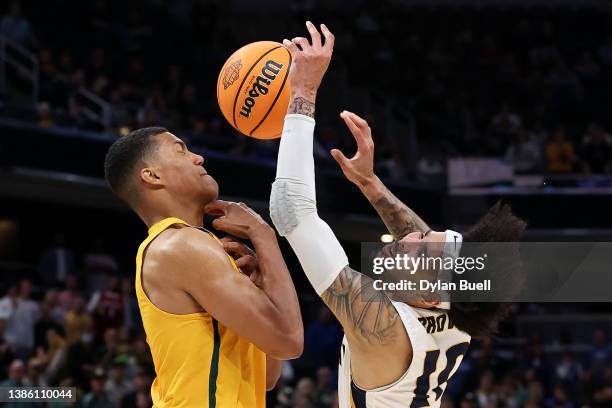 Tevin Brown of the Murray State Racers competes for the ball against Patrick Tape of the San Francisco Dons during the second half in the first round...