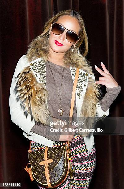Adrienne Bailon visits The Ami James Ink Tattoo Pop-Up Shop at the Empire Hotel on February 9, 2012 in New York City.
