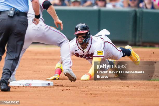 Ronald Acuna Jr. #13 of the Atlanta Braves steals second during the first inning against the Miami Marlins at Truist Park on July 02, 2023 in...
