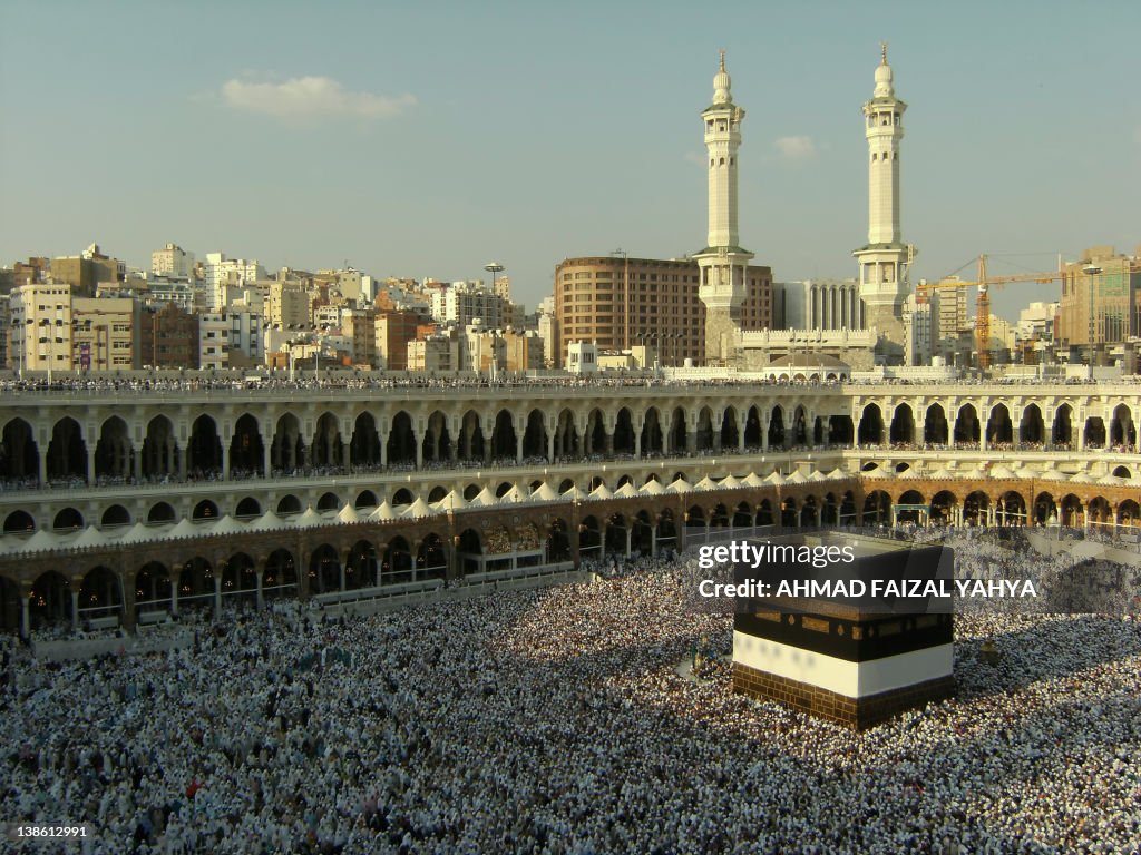 Muslim pilgrims circumambulate the Kaabah in Mecca