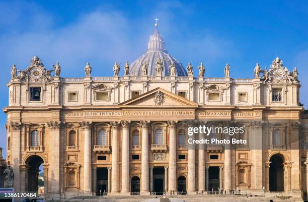 a blanket of fog envelops the dome of st. peter's basilica in the historic heart of rome - saint peter's basilica stock pictures, royalty-free photos & images