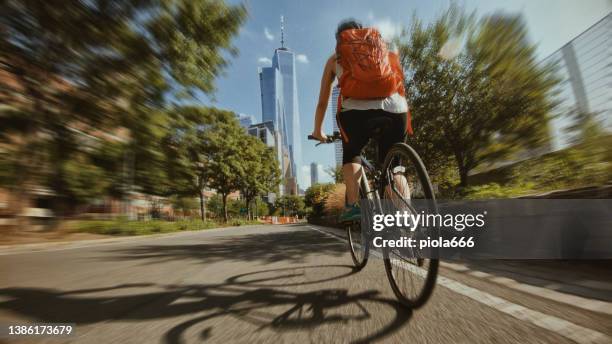 vacations in usa: pov road racing bicycle in manhattan, new york - action movie stock pictures, royalty-free photos & images