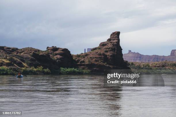 rafting with kayak in colorado river, moab - moab rafting stock pictures, royalty-free photos & images