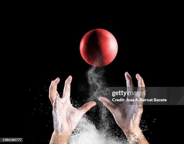 hands of a man playing sports with a ball. - ballon rebond stock pictures, royalty-free photos & images