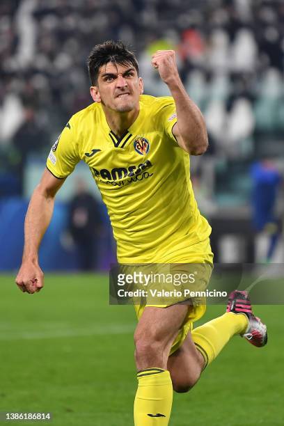 Gerard Moreno of Villarreal CF celebrates their sides first goal during the UEFA Champions League Round Of Sixteen Leg Two match between Juventus and...