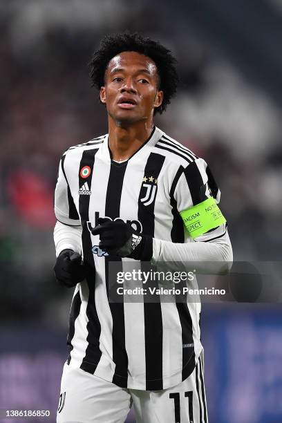 Juan Cuadrado of Juventus looks on during the UEFA Champions League Round Of Sixteen Leg Two match between Juventus and Villarreal CF at Juventus...