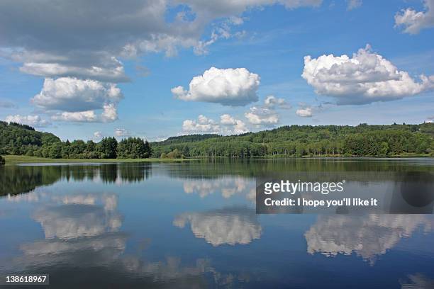 country landscape clouds with reflection in river - limoges - fotografias e filmes do acervo