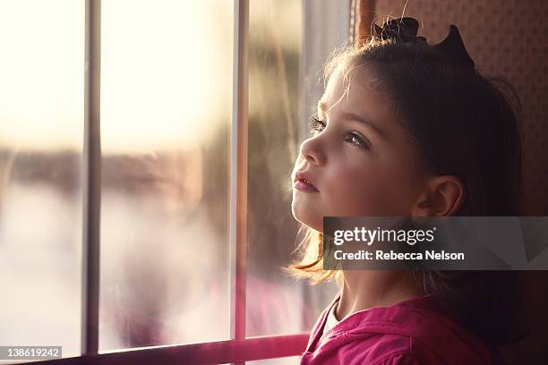Staring Longingly 33 Looking Longingly Out Window Stock Photos, High-Res Pictures, and ...