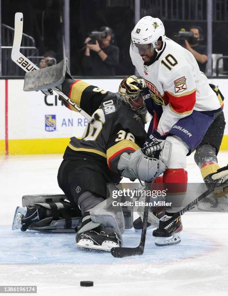 Logan Thompson of the Vegas Golden Knights blocks a shot by Anthony Duclair of the Florida Panthers in the first period of their game at T-Mobile...