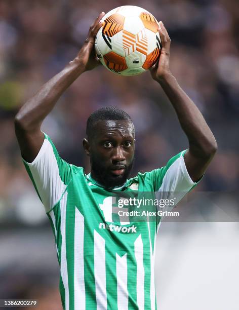 Youssouf Sabaly of Real Betis holds the ball during the UEFA Europa League Round of 16 Leg Two match between Eintracht Frankfurt and Real Betis at...