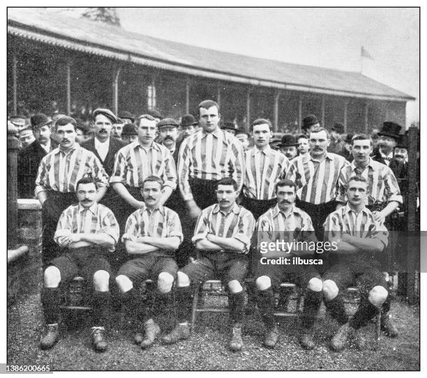 antique black and white photograph of sport, athletes and leisure activities in the 19th century: football team, sheffield united - soccer team stock illustrations