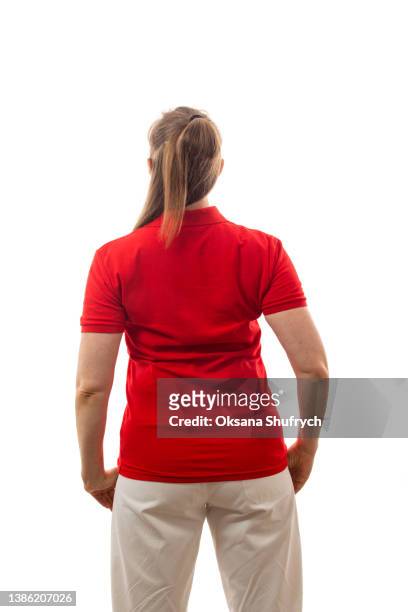 back view of woman in red t-shirt polo - blonde hair rear white background stock pictures, royalty-free photos & images