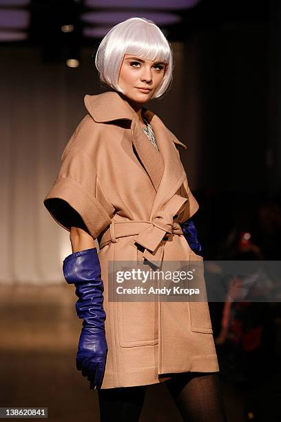 Model walks the runway at the Whit fall 2012 fashion show during Mercedes-Benz Fashion Week at Yotel on February 9, 2012 in New York City.