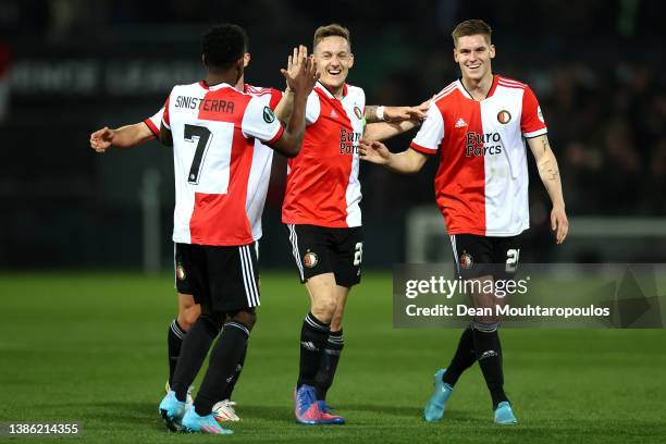 Jens Toornstra celebrates with teammates after Cyriel Dessers Feyenoord scored their sides first goal during the UEFA Conference League Round of 16...