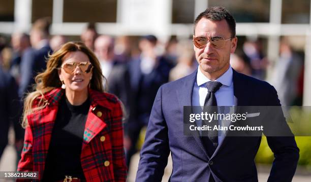 Footballer John Terry with his wife Toni on day four of The Festival at Cheltenham Racecourse on March 18, 2022 in Cheltenham, England.