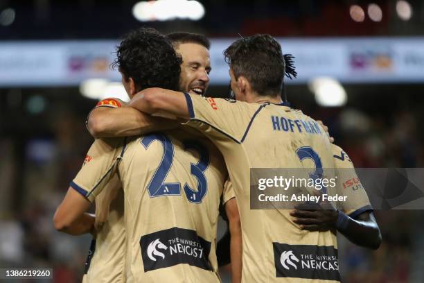 Eli Babalj of the Jets celebrates his goal with Jason Hoffman and Jordan Elsey and Matthew Jurman during the A-League Mens match between Newcastle...