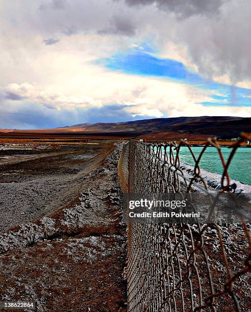 perimeter fencing of mining lithium salts - catamarca stock pictures, royalty-free photos & images