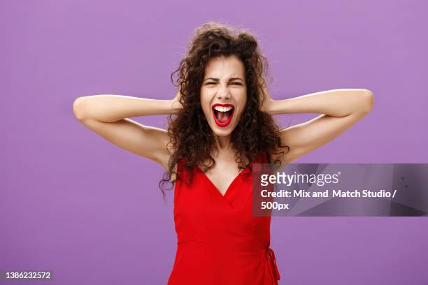 ex-boyfriend spoilt woman formal event being outraged and pissed - rich fury stock pictures, royalty-free photos & images