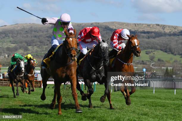 Paul Townend on Vauban approach the finish line before Jack Kennedy on Pied Piper to win The JCB Triumph Hurdle race during day four of the...