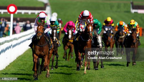 Paul Townend on Vauban approach the finish line to win The JCB Triumph Hurdle race during day four of the Cheltenham Festival 2022 at Cheltenham...