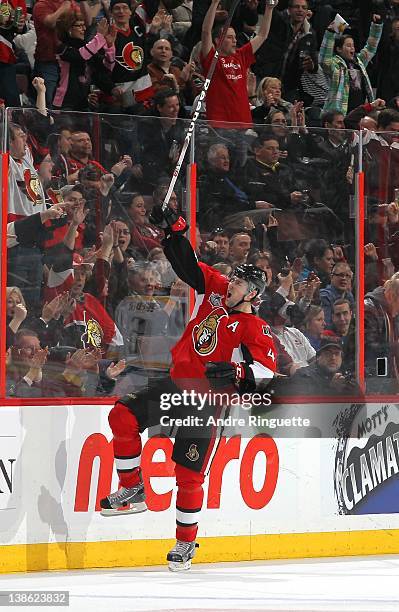 Playing in his 1000th career NHL game, Chris Phillips of the Ottawa Senators celebrates his second period goal against the Nashville Predators at...