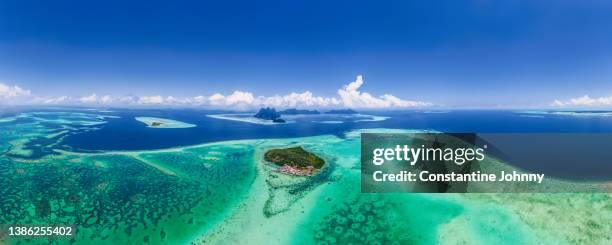 panoramic view of tropical ocean. aerial drone view of selakan, bohey dulang and bodgaya islands. - coral sea stock pictures, royalty-free photos & images