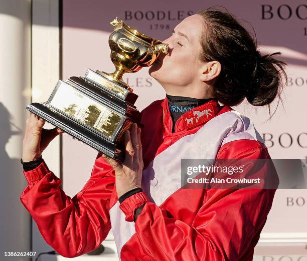 Rachael Blackmore kisses the Gold Cup after riding A Plus Tard to win The Boodles Cheltenham Gold Cup Chase on day four of The Festival at Cheltenham...