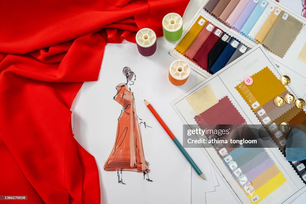 Fashion designers working in the studio.