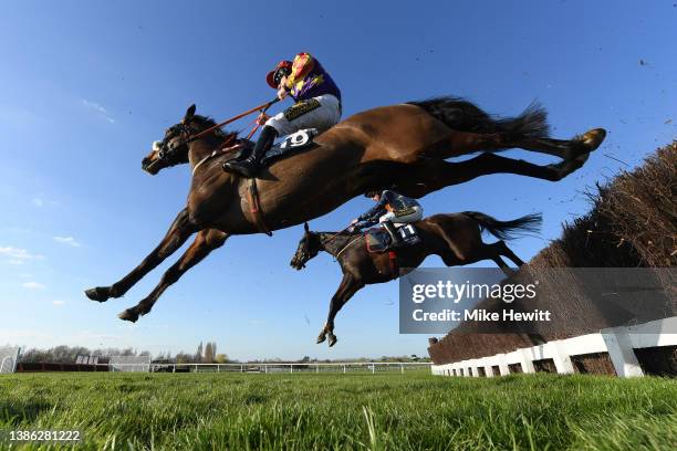 Barry O'Neill and Winged Leader jump the third last on their way to 2nd place in the St. James's Place Festival Challenge Cup Open Hunters' Chase on...