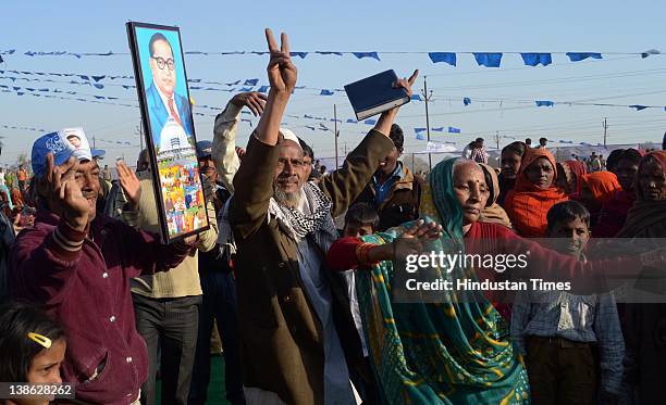 Bahujan Samaj Party supporters dance during a BSP rally that was addressed by Uttar Pradesh Chief Minister Mayawati at the parade ground February 9,...