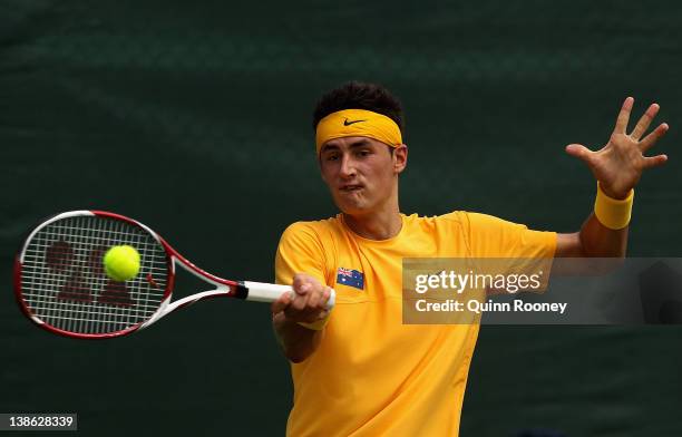 Bernard Tomic of Australia plays a forehand in his singles match against Wu Di of China during day one of the Davis Cup Asia Oceania Zonal Tie...