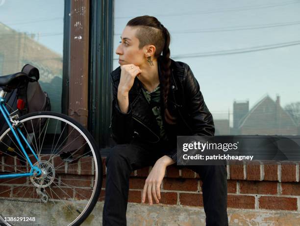 transgender person sitting in the city - indian transgender stock pictures, royalty-free photos & images