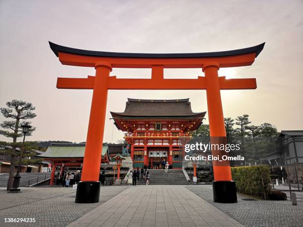 main gate at fushimi inari taisha - japan gate stock pictures, royalty-free photos & images