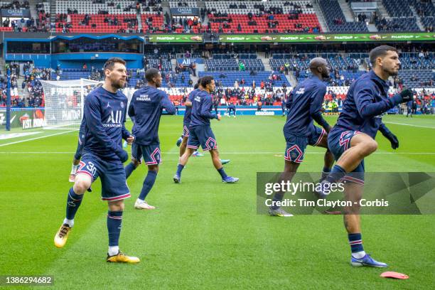 August 10: Lionel Messi of Paris Saint-Germain and Leandro Paredes of Paris Saint-Germain warming up with the team before the Paris Saint-Germain Vs...