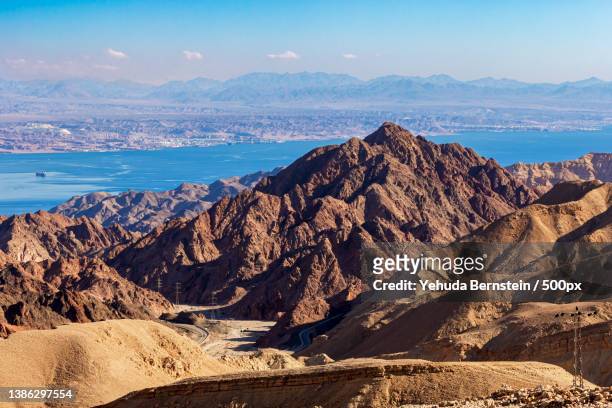 the gulf of eilat,scenic view of mountains against sky,israel - sinai stock-fotos und bilder
